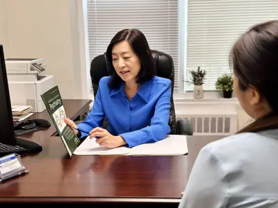 Dr. Yang Explaining Positive Treatment Options with Patient